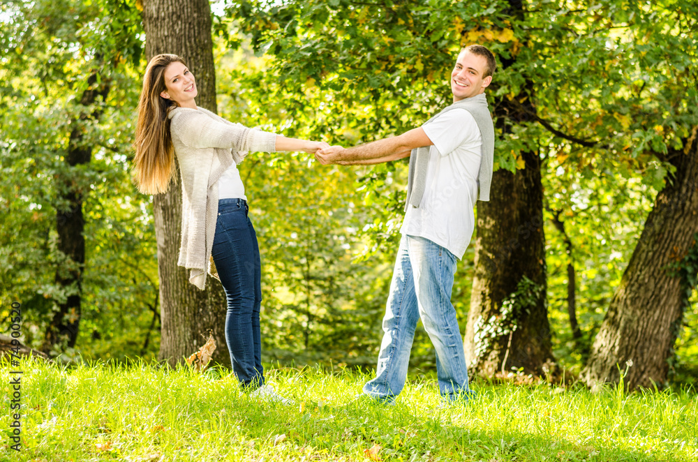 Happy young couple enjoying in the park Happy young couple enjoying in the park