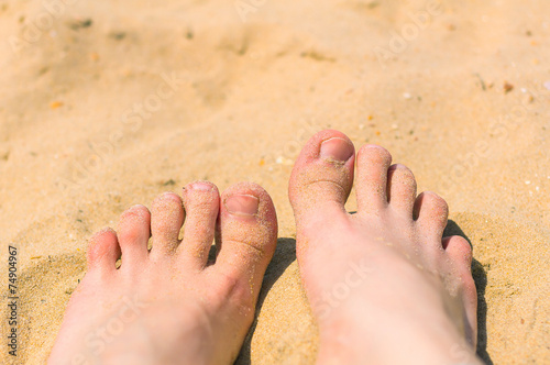 feet in the sand