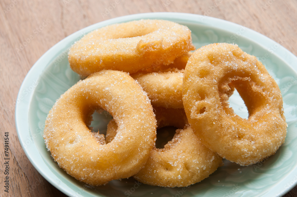 closeup of a pile of rosquillas, thai donuts