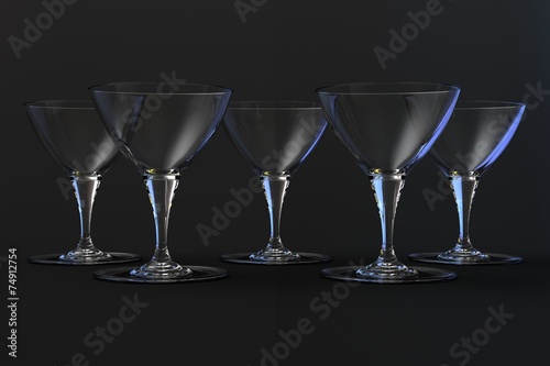 Martini glasses on a dark background, crystal.