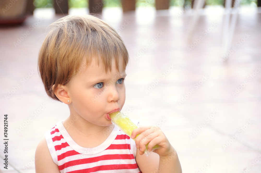 blue eyed girl sucking a lemon ice cream blue eyed girl sucking a lemon ice cream