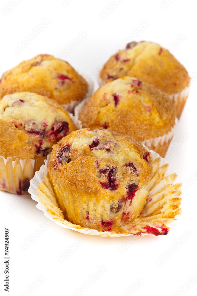 Fototapeta premium Cranberry muffins on white background. Selective focus.