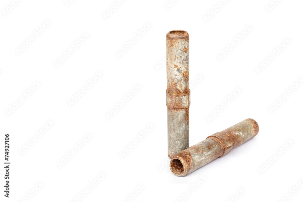 The rusty metal for connect scaffolding isolated on white backgr The rusty metal for connect scaffolding isolated on white backgr