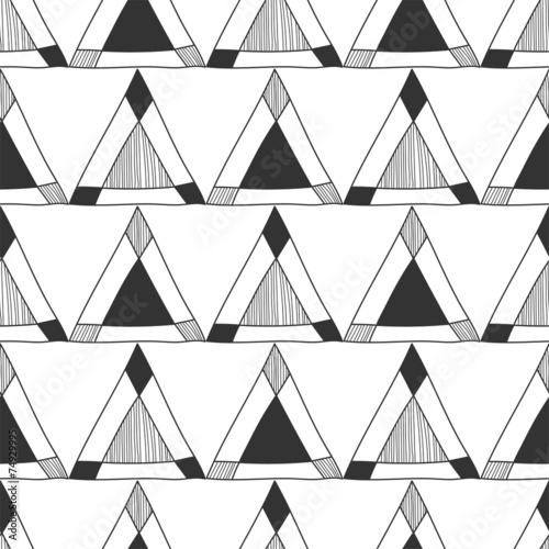 Seamless black and white abstract pattern of triangles