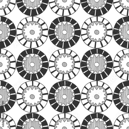 Seamless black and white abstract pattern of circles
