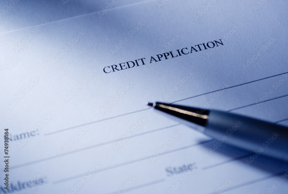 Conceptual Credit Application Form and Pen