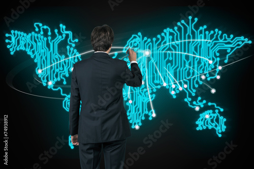 businessman drawing world map photo