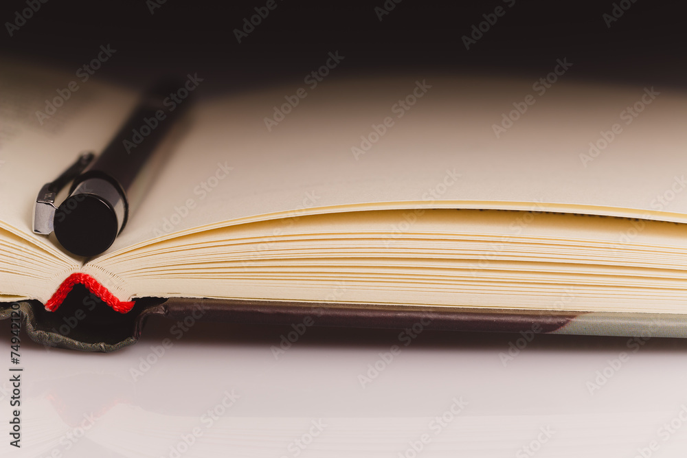 Book close up pencil partial light Book close up pencil partial light