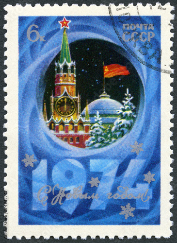 USSR - 1973: shows Spasski Tower, Kremlin, devoted New Year 1974 photo