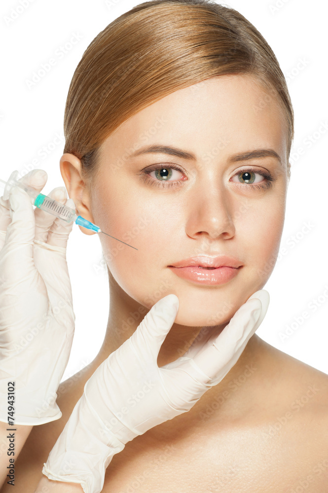 Cosmetic injection in young woman's face Cosmetic injection in young woman's face