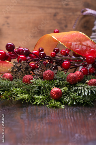 Red christmas baubles on the snow. christmas decorations