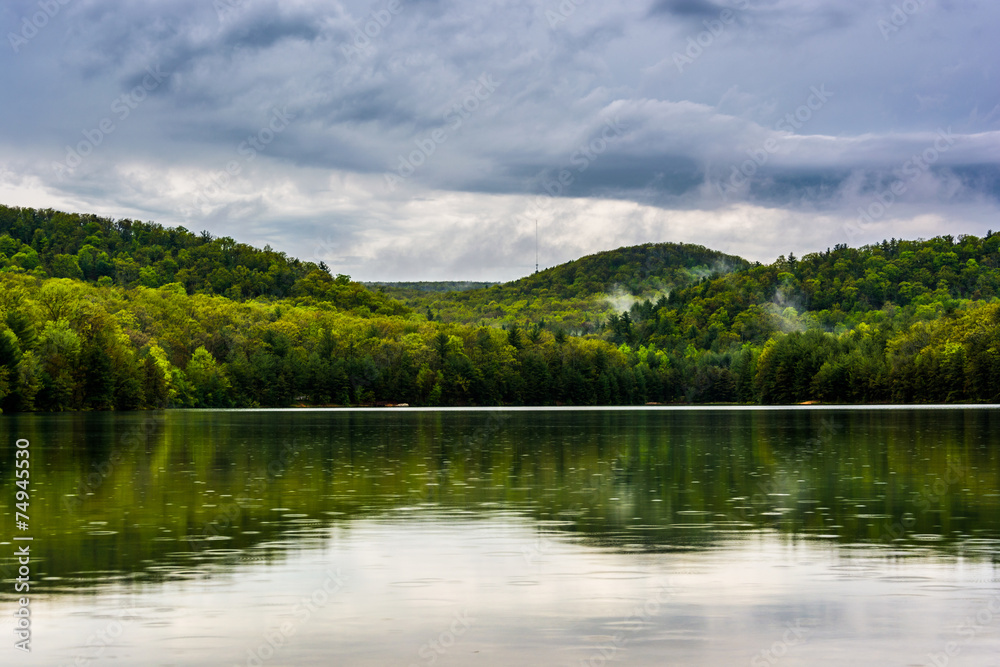 Clearing storm clouds over Long Pine Run Reservoir, in Michaux S