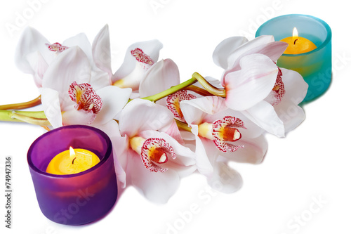 Fototapeta Naklejka Na Ścianę i Meble -  Branch of white orchid and candles