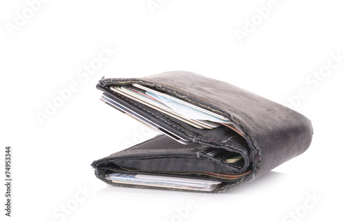 Old Wallet with money isolated on white background