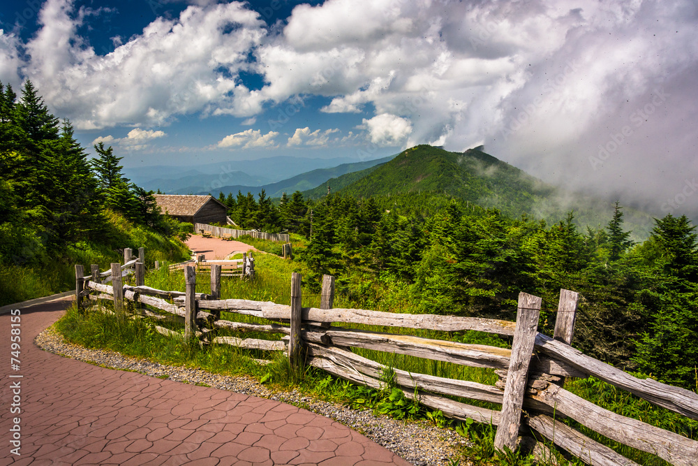 Fence along a trail and view of the Appalachians from Mount Mitc