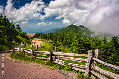 Fence along a trail and view of the Appalachians from Mount Mitc