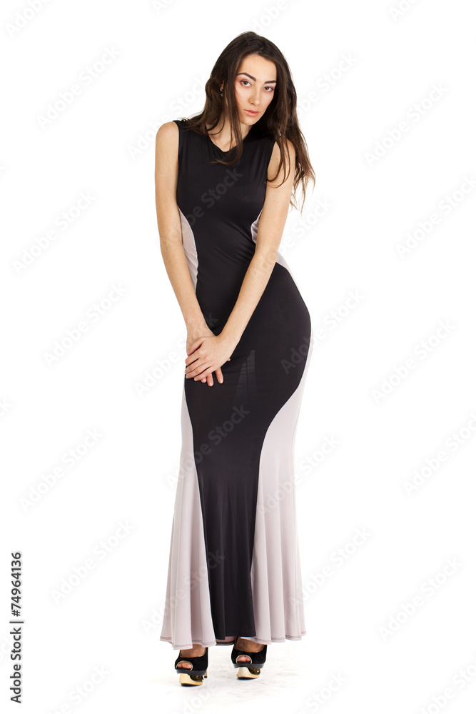Portrait in full growth of a young woman in long evening dress Portrait in full growth of a young woman in long evening dress