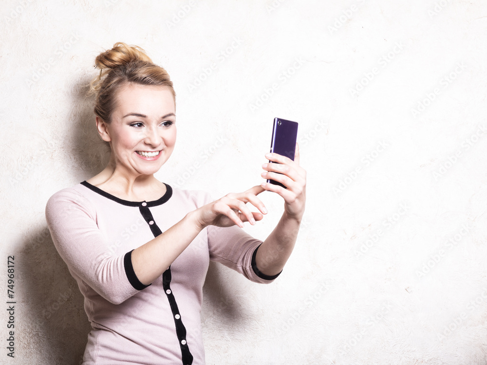 Businesswoman texting reading sms on smartphone Businesswoman texting reading sms on smartphone