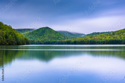 Long exposure of clouds moving over mountains and Long Pine Run