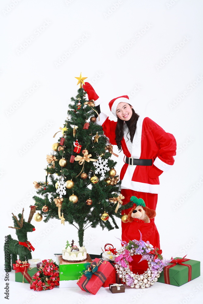 산타 복장을 한 여자 소녀와 선물들