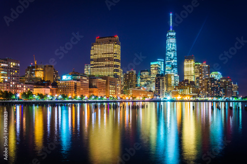 One World Trade Center and Battery Park City at night, seen from
