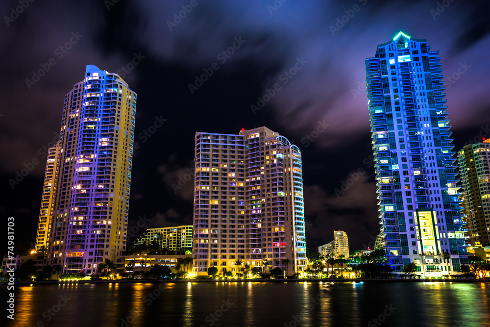Skyscrapers along the Miami River at night, in downtown Miami, F