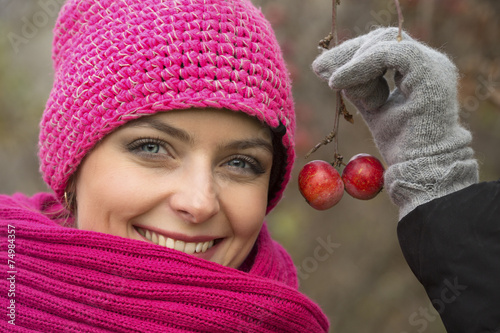 The girl's portrait with wild apples