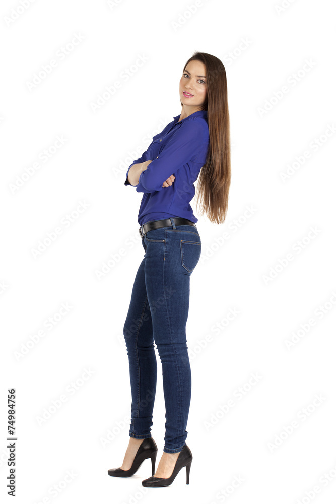 Portrait of a beautiful woman in blue jeans and blue shirt Portrait of a beautiful woman in blue jeans and blue shirt