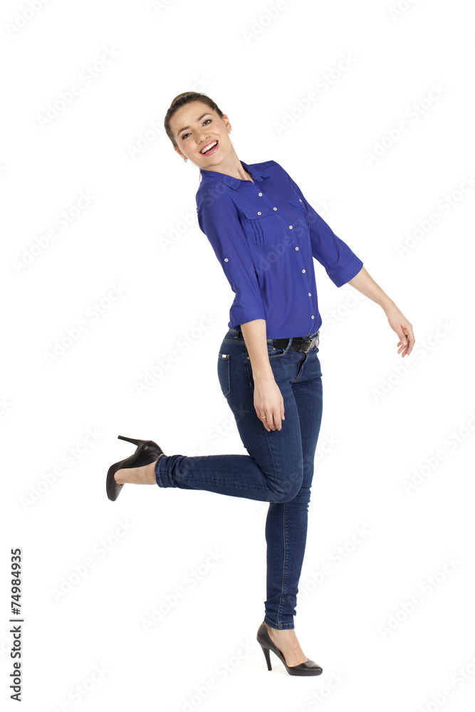 Portrait of a beautiful woman in blue jeans and blue shirt Portrait of a beautiful woman in blue jeans and blue shirt
