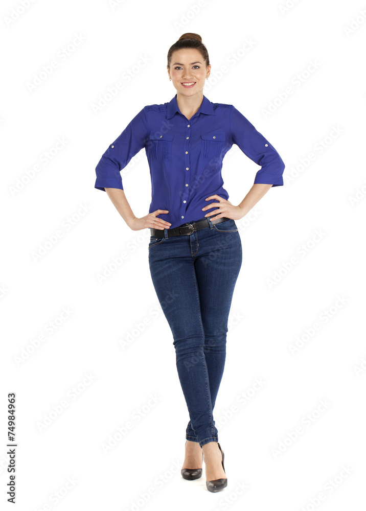 Portrait of a beautiful woman in blue jeans and blue shirt Portrait of a beautiful woman in blue jeans and blue shirt