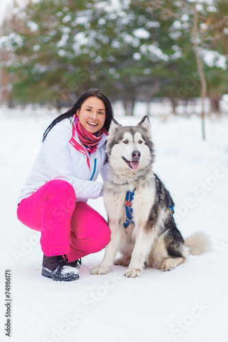 Woman with malamute