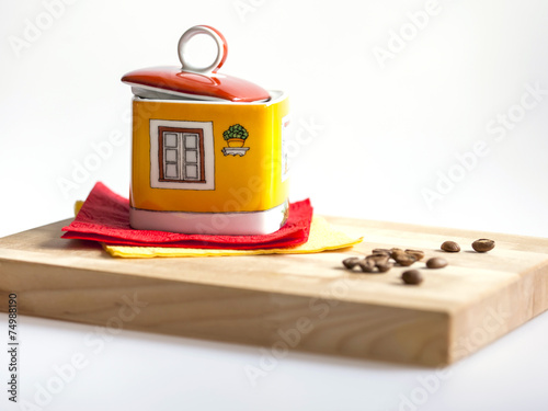 Ceramic capacity for storage of coffee and the fried coffee grai photo