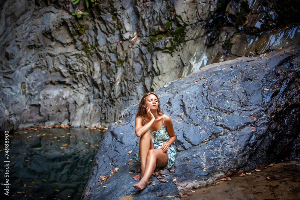 beautiful girl posing in dress at the waterfall beautiful girl posing in dress at the waterfall