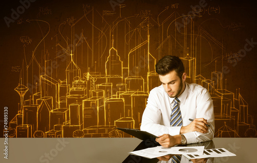 Businessman with buildings and numbers
