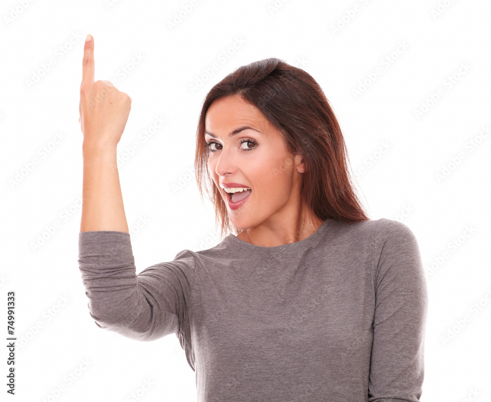 Happy hispanic with finger pointing up Happy hispanic with finger pointing up