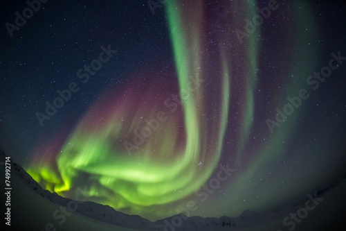 Foto Northern Lights on the Arctic sky
