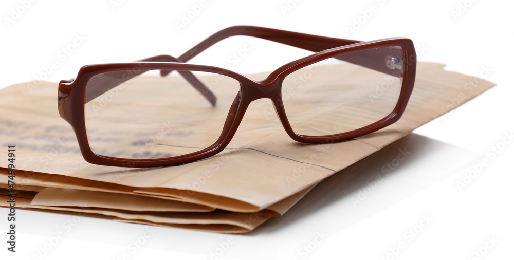 Glasses and newspapers, isolated on white Glasses and newspapers, isolated on white