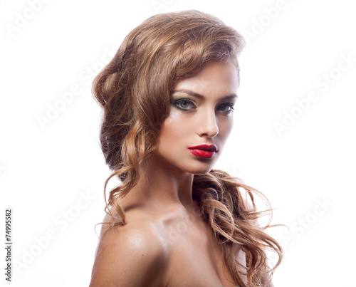 Beautiful young woman with classy makeup and hair