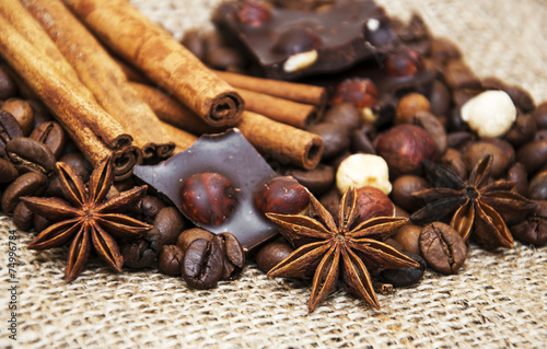 Coffee beans with cinnamon sticks and chocolate