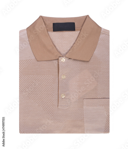 shirt. mens folded polo shirt on a background © heinteh