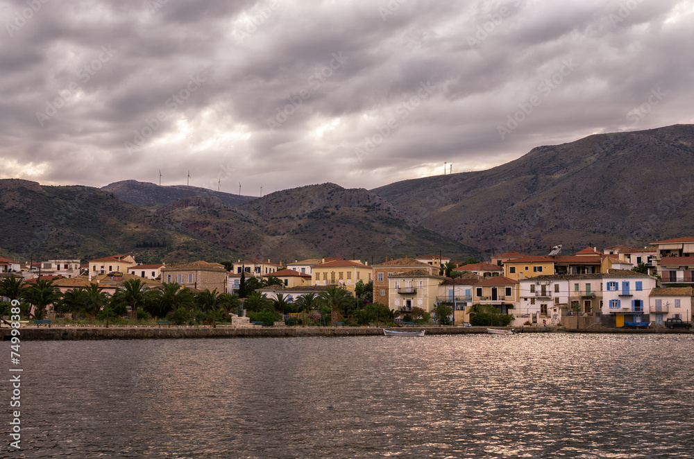 The historic town of Galaxidi, Greece, at dusk, on a cloudy day