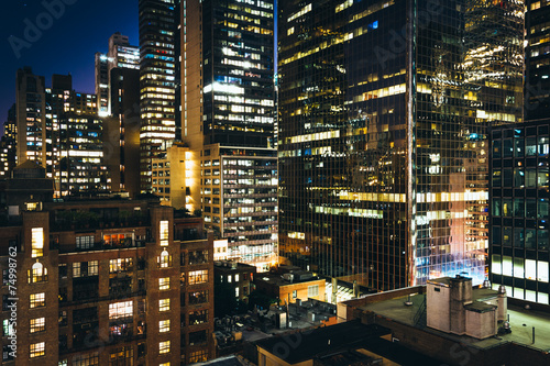 View of buildings in the Turtle Bay neighborhood at night, from