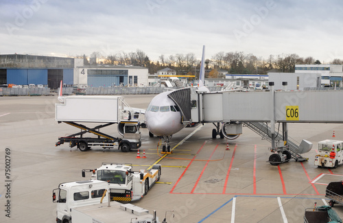 passenger aircraft is in the Dusseldorf airport, Germany..