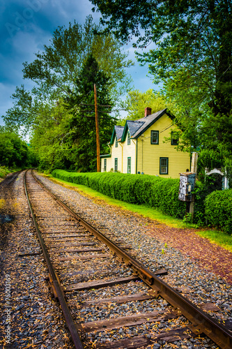 House along railroad tracks in Portland, Pennsylvania.