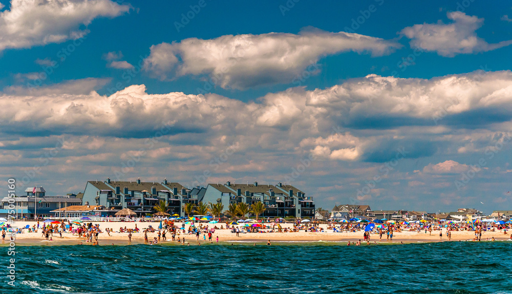 People and buildings on the beach in Point Pleasant Beach, New J