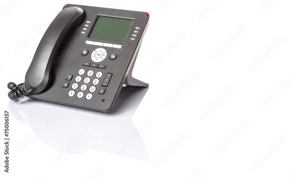 Modern desktop telephone over white background Modern desktop telephone over white background