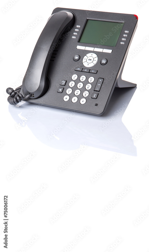 Modern desktop telephone over white background Modern desktop telephone over white background
