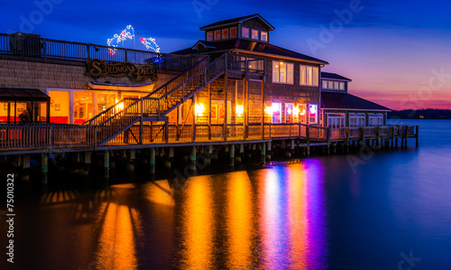 Solomon's Pier Restaurant reflecting in the Patuxent River at su photo