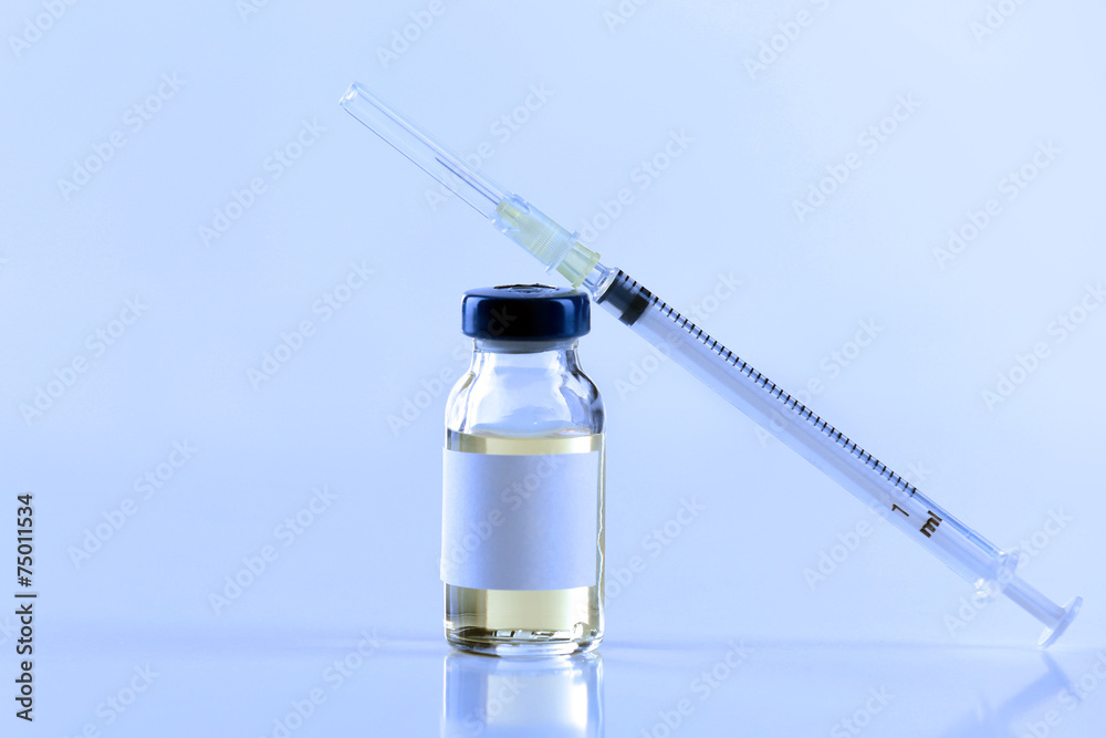 Vaccine in vial with syringe Vaccine in vial with syringe
