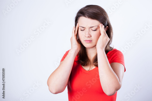 Woman having pain in temples